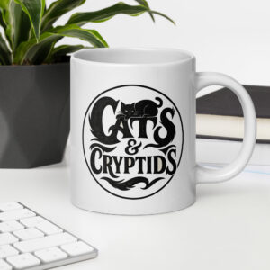 white-glossy-mug-white-20-oz-office-environment-6939b39e5cfcb.jpg Cats & Cryptids 11oz or 20oz Mug